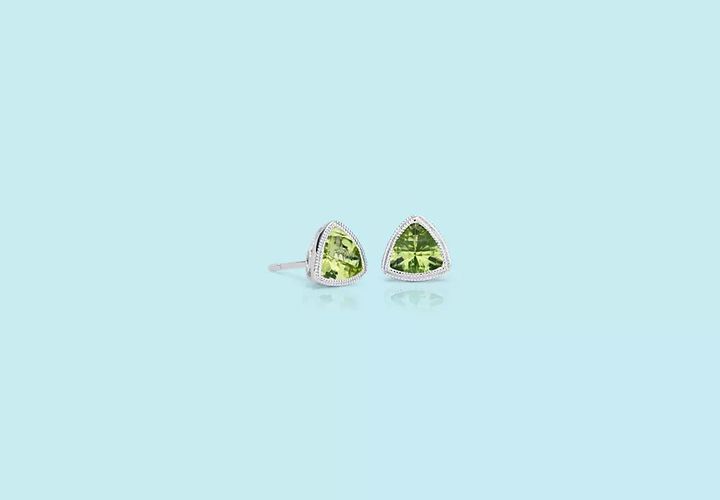 A pair of trillion cut peridot earrings